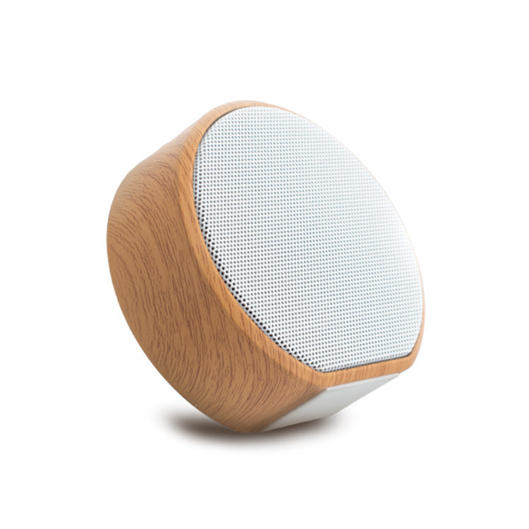 Mini Wood Bluetooth Speaker Portable Outdoor Wireless with white mesh grille, compact design ideal for travel and outdoor adventures.