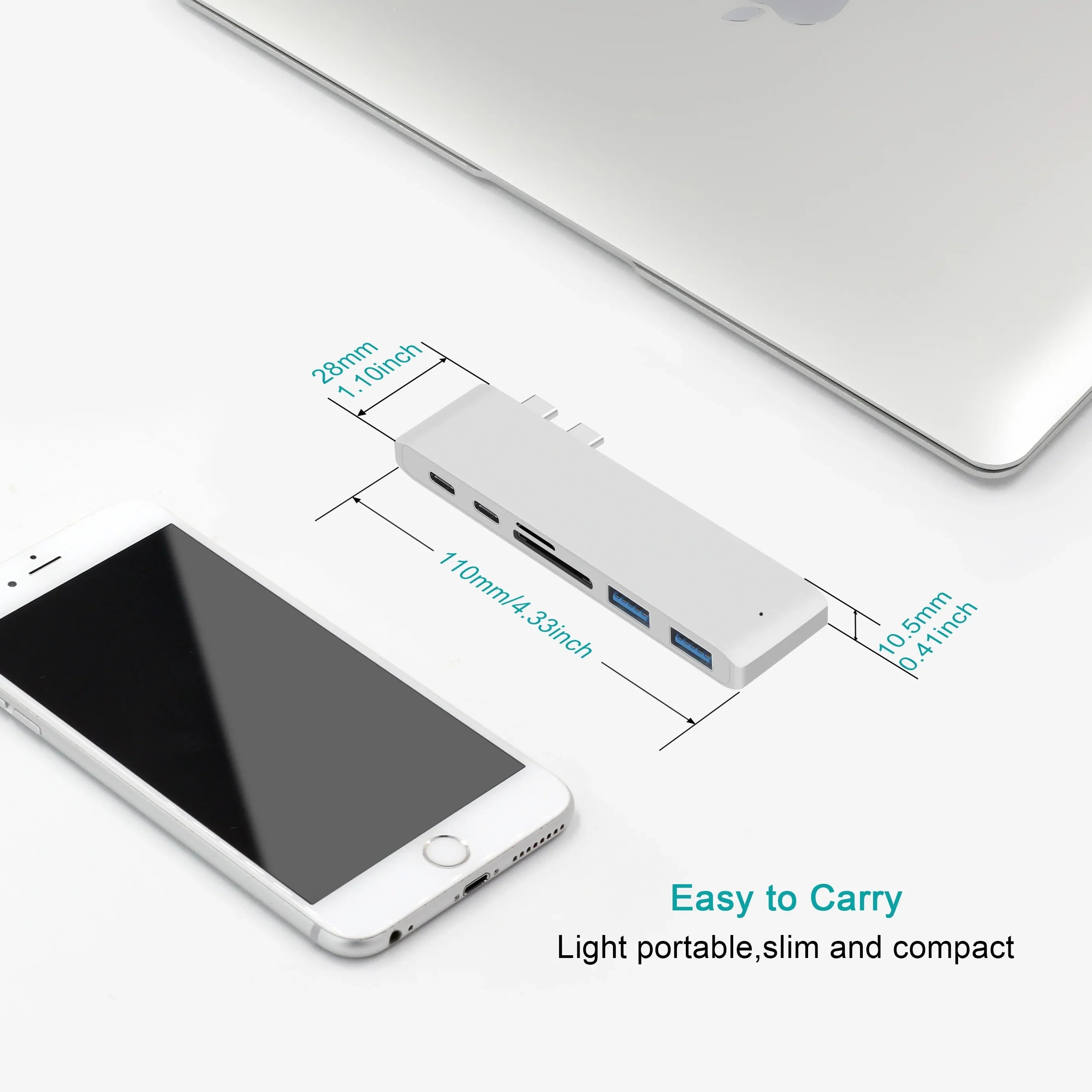 Compact and portable USB C Hub Adapter for MacBook Pro with 6 ports. Slim design fits easily next to iPhone and MacBook.