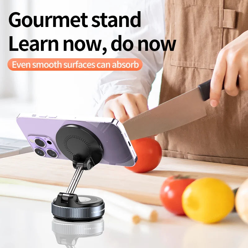 360° magnetic phone holder used as a kitchen stand for iPhone 12-16. Strong suction base supports hands-free wireless charging on smooth surfaces.