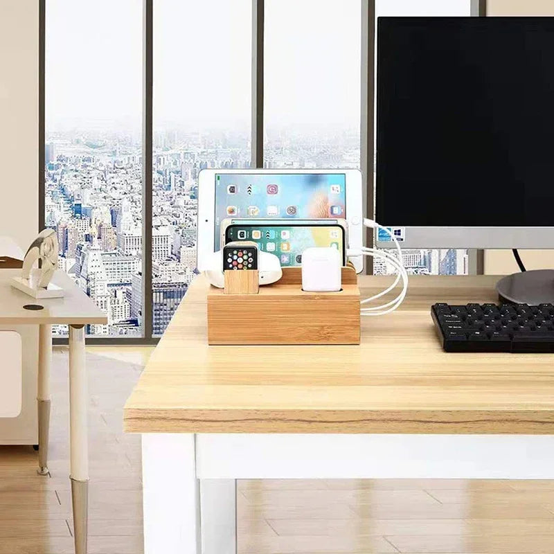 Bamboo charging station on office desk organizing multiple devices. Stylish bamboo material complements modern workspace decor.