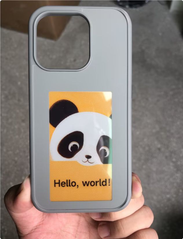 Gray E-ink screen phone case with panda image and text "Hello, world!" on display